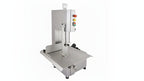 Stainless steel band saw machine on a white background
