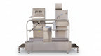 Industrial packaging machine on a white background