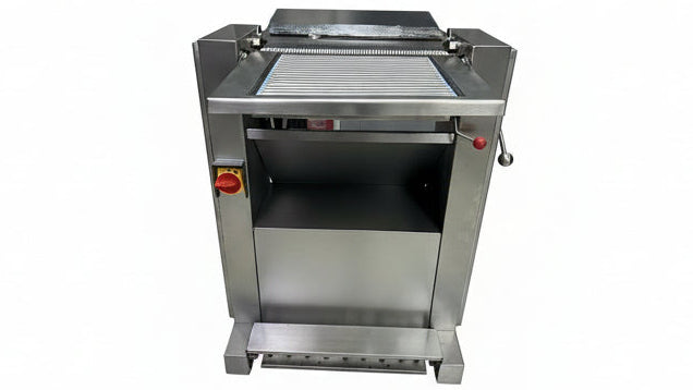 Stainless steel dough sheeter with Kochmann branding on a tiled floor.